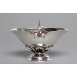 A GEORG JENSEN SUGAR BASKET, stamped 925.S, Sterling, 235B, the lightly planished flared oval bowl