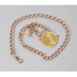 A VICTORIA JH HEAD GOLD £2, 1887, hard mounted and pendant from a 9ct gold curb link Albert chain