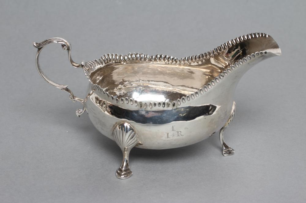 A LATE GEORGE III SAUCEBOAT, maker Langlands & Robertson, no date letter, cut duty mark c.1791,