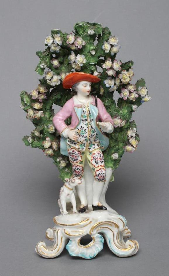 A CHELSEA PORCELAIN FIGURE, c.1765, modelled as a young gentleman wearing a broad brimmed hat,