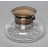 A LATE VICTORIAN CLEAR GLASS INKWELL, maker Heath & Middleton, London 1895, of squat domed form with