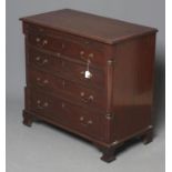 A SMALL GEORGIAN STYLE MAHOGANY STRAIGHT FRONT CHEST, 19th century, the moulded edged and banded top