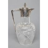 A LATE VICTORIAN GLASS CLARET JUG, maker Atkin Bros., Sheffield 1892, of baluster form with slice,