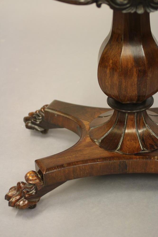 AN EARLY VICTORIAN ROSEWOOD CARD TABLE, the banded rounded oblong top opening to a circular green - Image 4 of 5