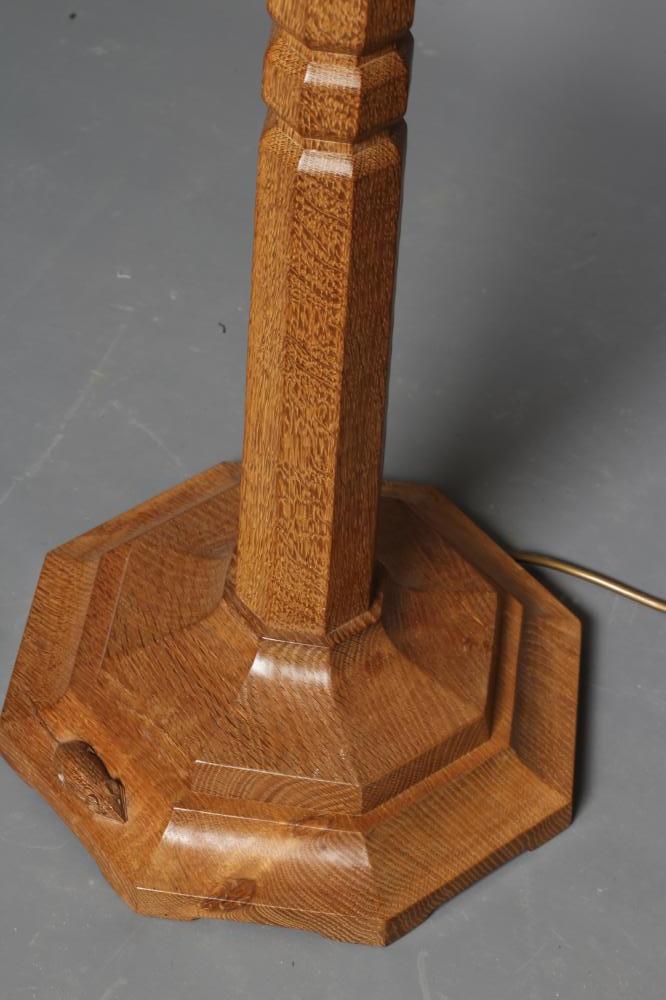 A ROBERT THOMPSON ADZED OAK STANDARD LAMP, of tapering faceted form with collared stem, the - Image 3 of 4