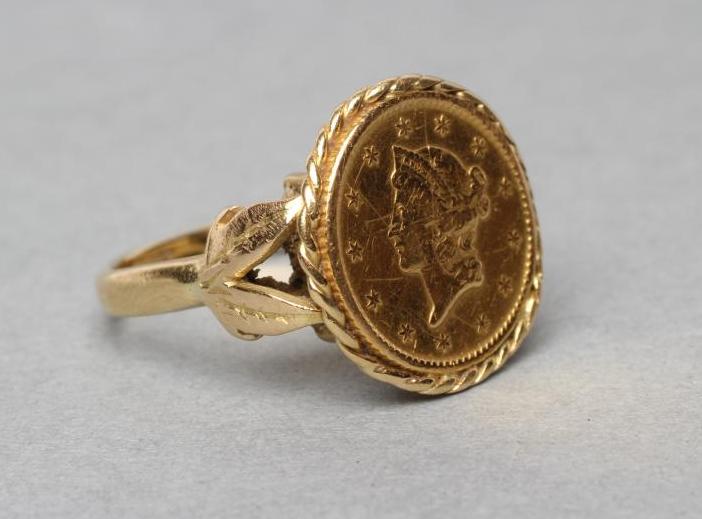 A GOLD $1, 1853, loose mounted as a ring, shank mark rubbed, size J (Est. plus 21% premium inc.