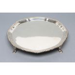 A SMALL SALVER, maker Reid & Sons, London 1926, of shaped circular form, the pie-crust rim with