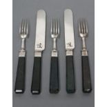 TWO PAIRS OF DESSERT KNIVES AND FORKS, the plated blades and tines engraved with a crest by