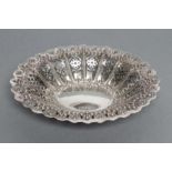 A LATE VICTORIAN SWEETMEAT DISH, maker Martin, Hall & Co., Sheffield 1895, of lobed everted oval