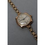 A LADY'S 9CT GOLD WRISTWATCH, the silvered dial with black Arabic numerals enclosing subsidiary