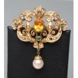 A MULTI-GEM SET 18CT GOLD RENAISSANCE STYLE BROOCH/PENDANT of open cartouche form, the central