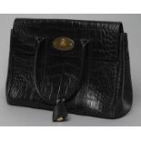 A MULBERRY PRINTED BLACK LEATHER "BAYSWATER" HANDBAG, with duster bag, 11" high (2) (Est. plus 21%