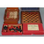 AN EDWARDIAN JAQUES OF LONDON TRAVELLING CHESS SET, in natural and stained red bone, kings 1/2"