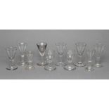 A COLLECTION OF TEN DRAM AND OTHER GLASSES, late 18th century and later, several with a folded foot,