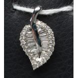 A DIAMOND LEAF PENDANT to match the previous lot (Est. plus 21% premium inc. VAT)