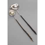 A LATE GEORGE III PUNCH LADLE, possibly Charles Hougham, London 1791, the single lipped oval bowl