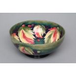 A MOORCROFT POTTERY LEAVES AND POTTERY PATTERN BOWL, mid 20th century, tubelined and painted in