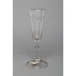 AN ALE FLUTE, late 18th century, the funnel bowl with slice cutting, on a facet cut stem and