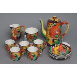 AN ART DECO WINTON POTTERY "JAZZ" COFFEE SERVICE of plain tapering cylindrical form, painted in