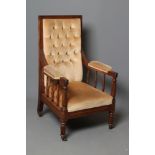 A GENTLEMAN'S GEORGE IV MAHOGANY SHOW FRAME ARMCHAIR button upholstered in champagne dralon, the