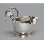 JOHAN ROHDE FOR GEORG JENSEN, a butter boat, stamped 925.S, Sterling 321B, the plain oval bowl