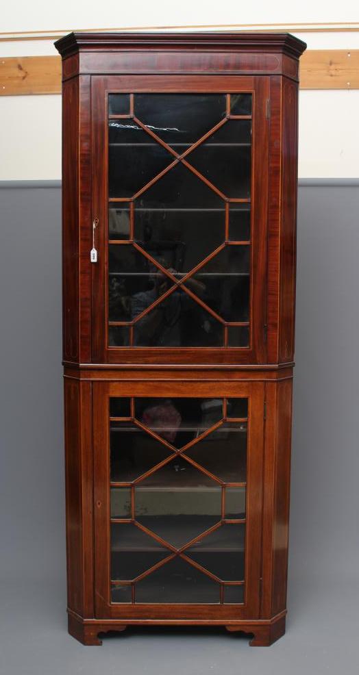 A MAHOGANY STANDING CORNER CUPBOARD, 19th century, the moulded cornice over single astragal glazed