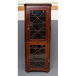 A MAHOGANY STANDING CORNER CUPBOARD, 19th century, the moulded cornice over single astragal glazed