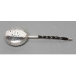 AN EARLY VICTORIAN SILVER NOVELTY TEA INFUSER, maker's mark rubbed, London 1845, modelled as a bed