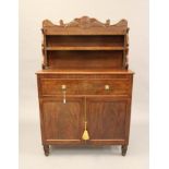 A MAHOGANY SECRETAIRE CABINET, early 19th century, the banded top with shelved upper section on