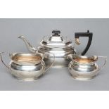 A THREE PIECE TEA SERVICE, maker Harrison, Fisher & Co., Sheffield 1936 (teapot) and 1937, of