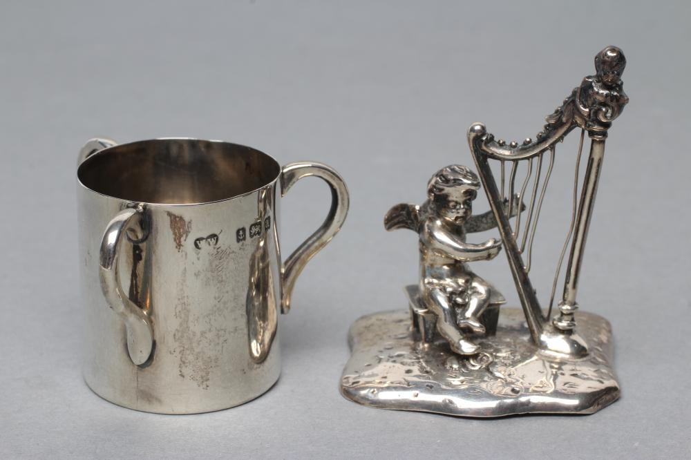 A SMALL SILVER FIGURE, maker Bertholdt Muller, Chester import marks 1901, modelled as a cherub