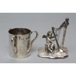 A SMALL SILVER FIGURE, maker Bertholdt Muller, Chester import marks 1901, modelled as a cherub