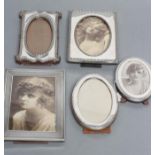 A COLLECTION OF FIVE EASEL BACK PHOTOGRAPH FRAMES, comprising two oval, Chester 1919, 6 1/4" high,