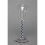 A WINE GLASS, mid 18th century, the bell bowl on a single blue twist enclosing a multi-ply air