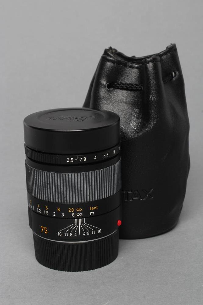 A LEICA SUMMARIT-M LENS, 1:25/75, E46, 4058607, with end caps and leather Contax case (Est. plus 21%