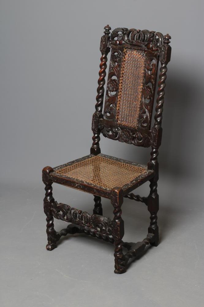 A CHARLES II CARVED WALNUT SIDE CHAIR, 17th century, with caned back and seat, spiral uprights