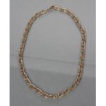 A 9CT GOLD TRIPLE CURB CHAIN NECKLACE, Birmingham 1998, with lobster clasp, 28.6g (Est. plus 21%