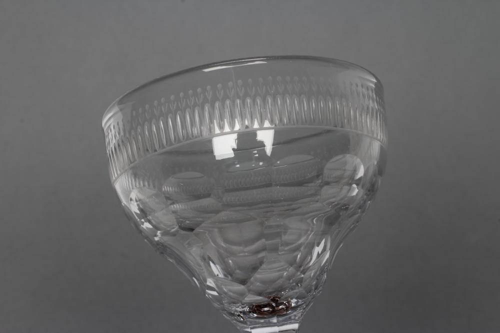 A SWEETMEAT GLASS, late 18th century, the panel cut wide ogee bowl on central knopped faceted stem - Image 2 of 4