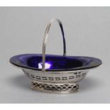 A GEORGE III EPERGNE BASKET, maker probably Thomas Evans, London 1784, of plain oval form with
