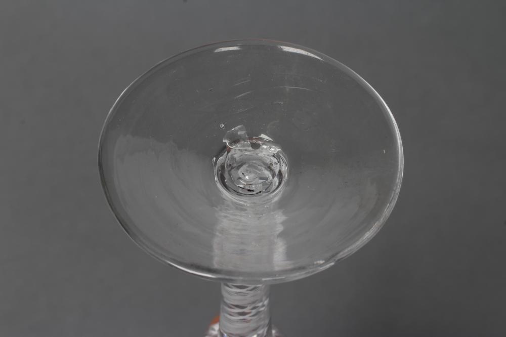 A WINE GLASS, mid 18th century, the semi-wrythen mould blown round funnel bowl on an opaque twist - Image 3 of 3