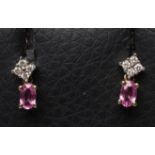 A PAIR OF PINK SAPPHIRE AND DIAMOND DROP EAR STUDS set in 9ct white and yellow gold (Est. plus 21%