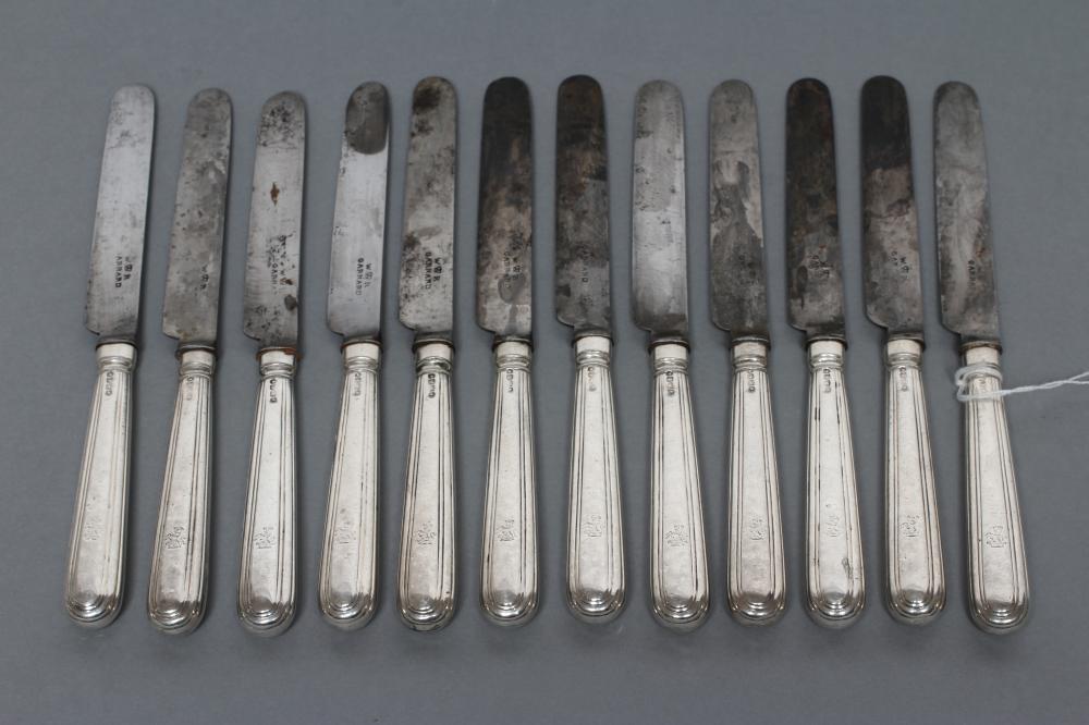 A SET OF TWELVE WILLIAM IV DESSERT KNIVES, maker's mark SP, London 1837, the reeded stamped and