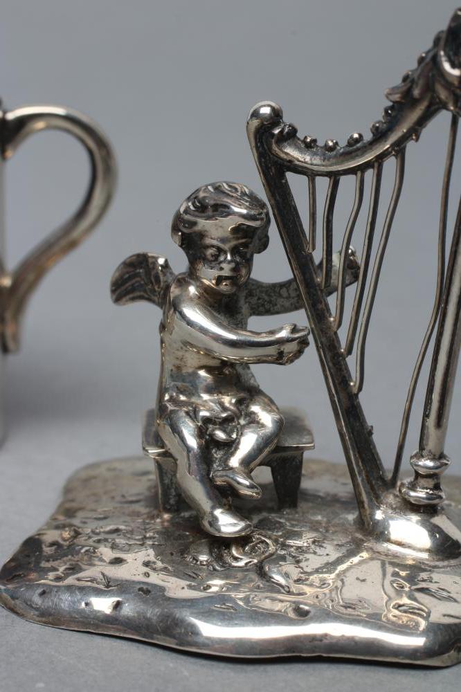 A SMALL SILVER FIGURE, maker Bertholdt Muller, Chester import marks 1901, modelled as a cherub - Image 2 of 4