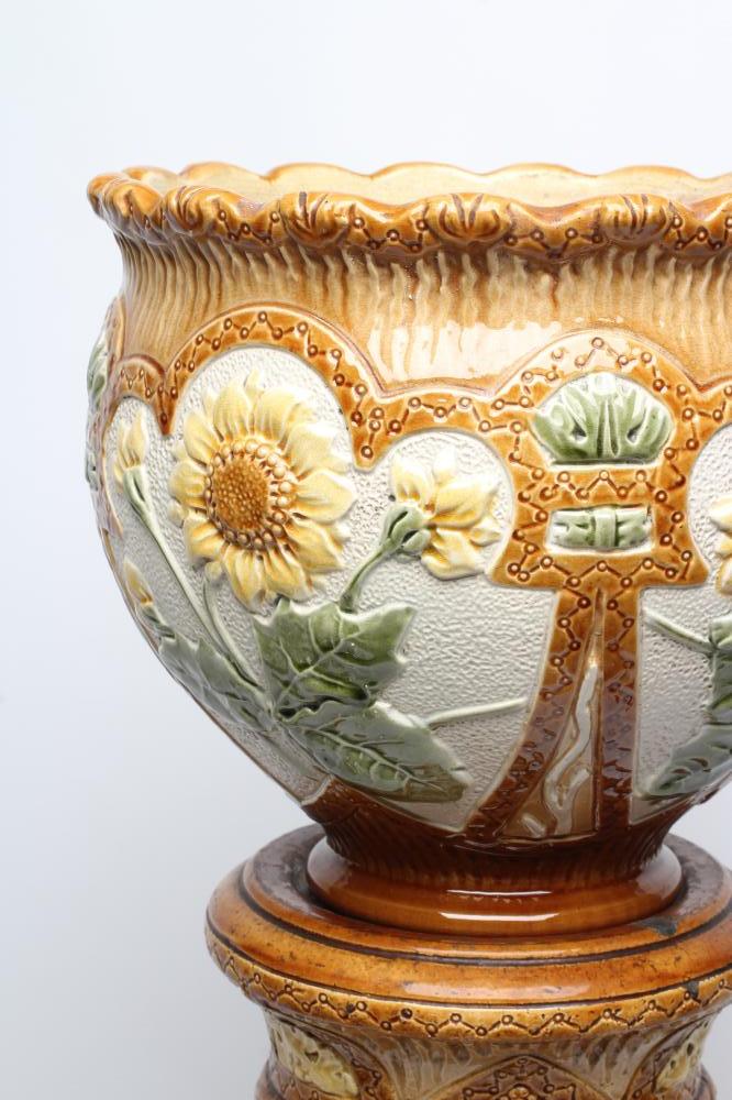 A BURMANTOFTS FAIENCE JARDINIERE AND STAND, early 20th century, moulded in relief and painted in - Image 3 of 6