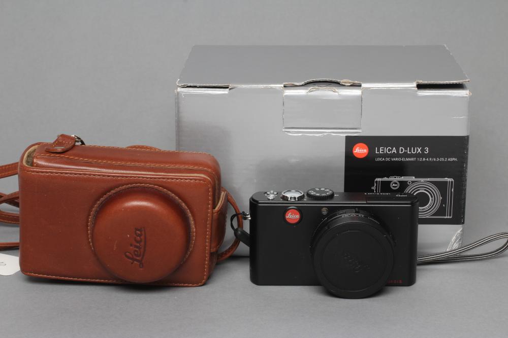 A LEICA D-LUX 3 DIGITAL CAMERA with DC Vario-Elmarit lens, leather case and box (Est. plus 21%