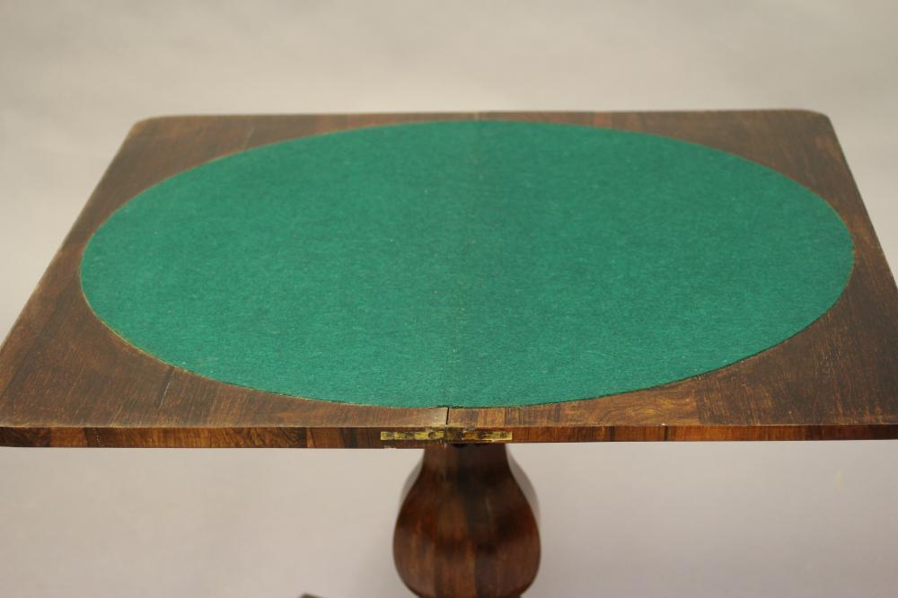 AN EARLY VICTORIAN ROSEWOOD CARD TABLE, the banded rounded oblong top opening to a circular green - Image 5 of 5