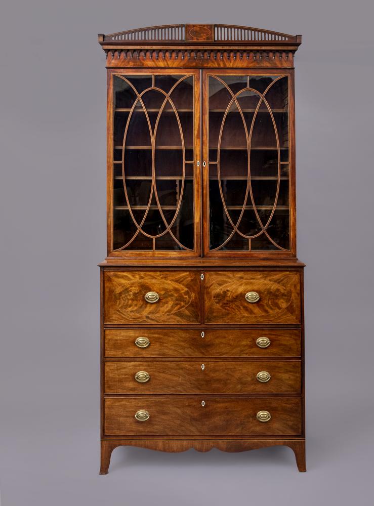 A GEORGIAN MAHOGANY SECRETAIRE BOOKCASE, c.1800, with rosewood banding and stringing, the lambrequin