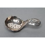 A SILVER CADDY SPOON, maker's mark L Ltd., Birmingham 1920, the floriform bowl with eliptical