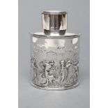 A LATE VICTORIAN TEA CANISTER, maker Thomas Hayes, Birmingham 1897, of oval section, chased with a