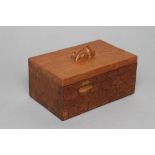 A ROBERT THOMPSON ADZED OAK TRINKET BOX of oblong form, carved mouse trademark in high relief on